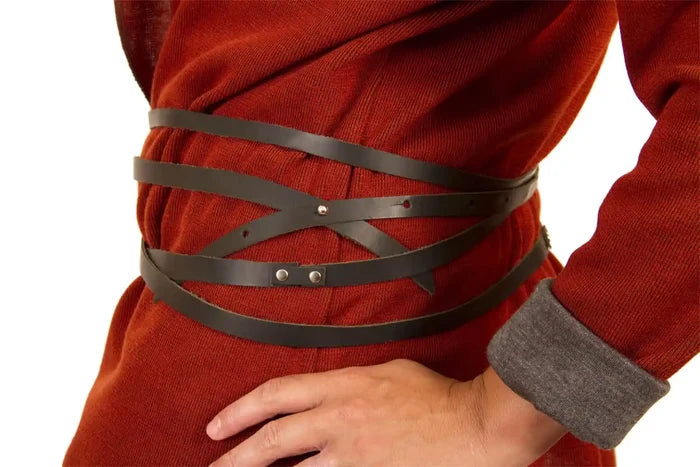 Person wearing a red outfit with a black leather belt