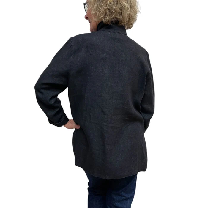 Person wearing a dark gray coat on a white background