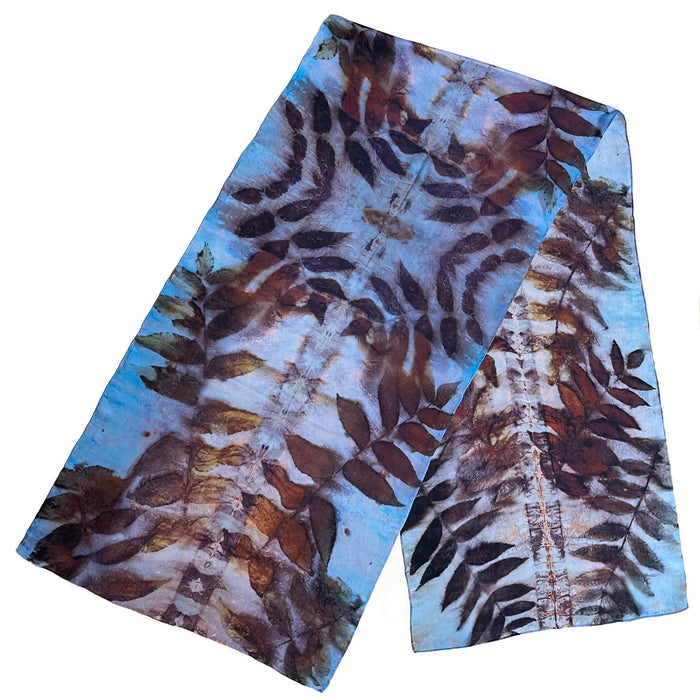 Scarf with leaf pattern on a white background
