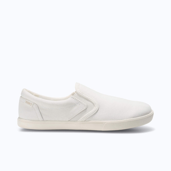 Xero Shoes Dillon Canvas Slip-On Women Sneaker in White with a White Sole, Toe Facing Right