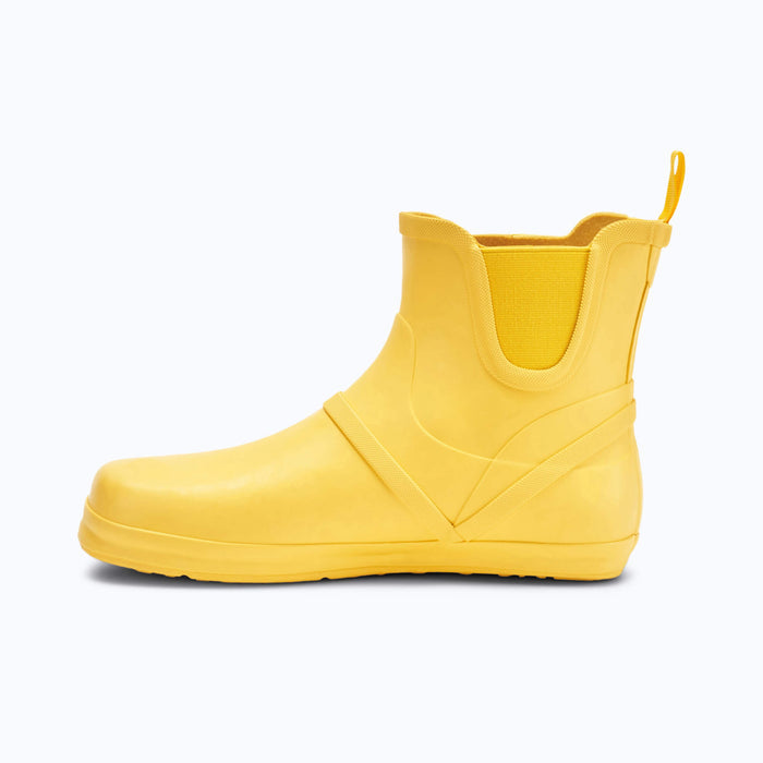 Xero Shoes Women's Gracie Barefoot Rain Boot in Yellow with Toe Facing Left