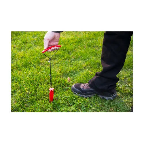 swiss piranha peg puller in use