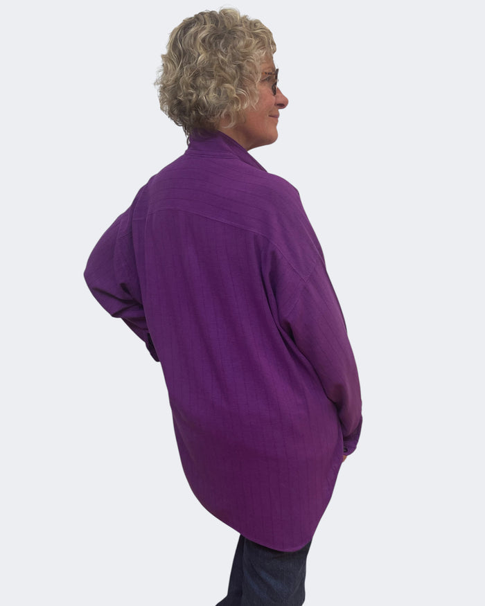 Person wearing a Purple Linen Viscose Boyfriend Shirt Hand Dyed against a white background