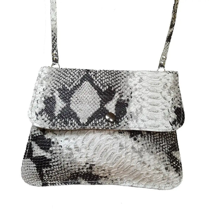 Snake print handbag with a silver clasp on a white background
