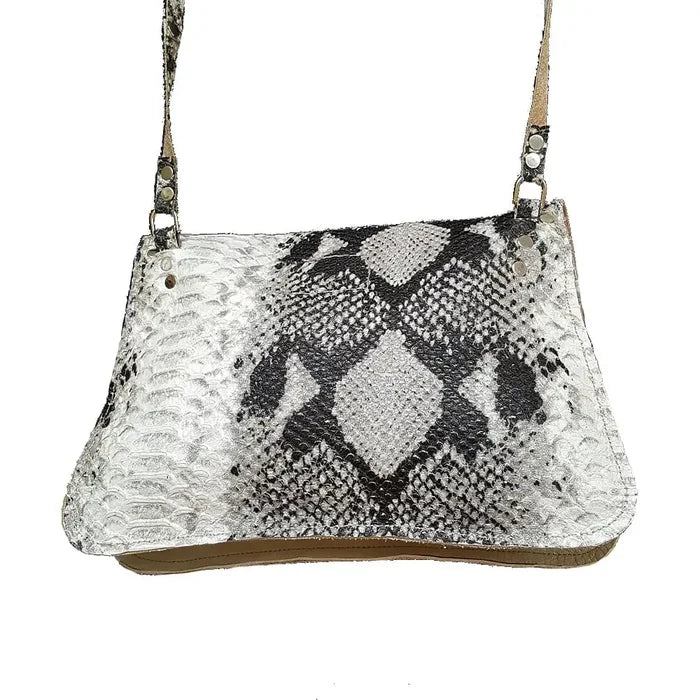 Snake print handbag with a white background