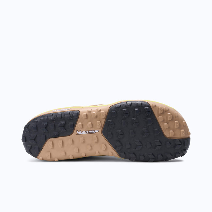 Xero Shoes Scramble Low EV Women Shoe Outsole at Tan and Black with Toe Facing Right