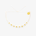 White Alphabet Bead Bracelet