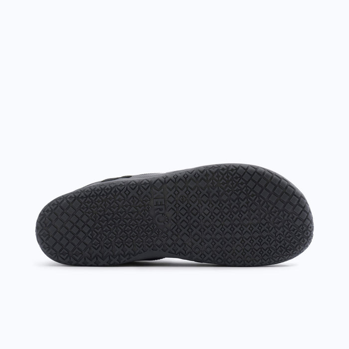 Xero Shoes XT Max Men Shoe in Black with Black Outsole and Toe Facing Right